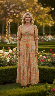 La robe en soie orange à smocks